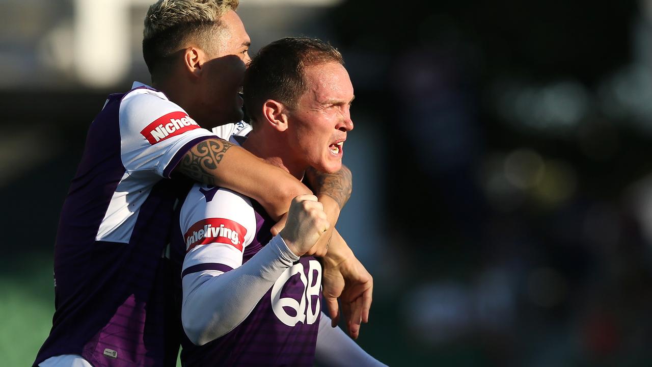 Neil Kilkenny of the Glory celebrates a goal with Jason Davidson