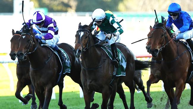 SYDNEY, AUSTRALIA - AUGUST 24: Jason Collett riding Kimochi wins Race 9 James Squire Toy Show Quality during Winx Stakes Day - Sydney Racing at Royal Randwick Racecourse on August 24, 2024 in Sydney, Australia. (Photo by Jeremy Ng/Getty Images)