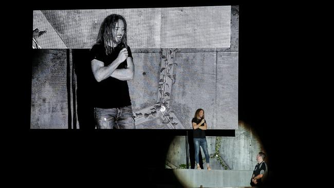 Tim Minchin chats to a security guard between songs during his show on the new outdoor stage at the Gold Coast’s Home of the Arts. Picture: Lexi Spooner.