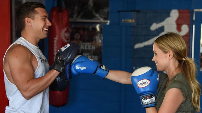 Ian D'Andrade with Emma Victoria Lane at his gym in Bundall. Photo: Steve Holland