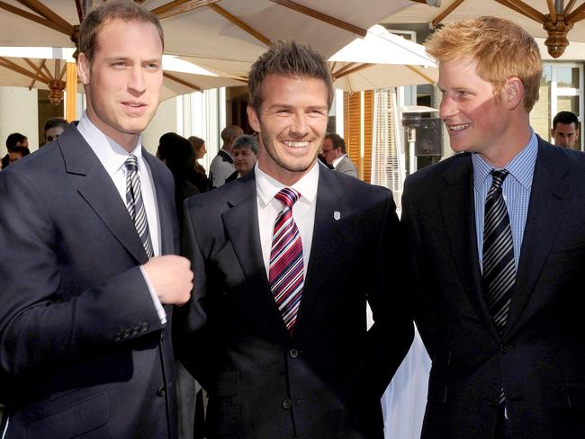 England team ambassador David Beckham, centre, Prince William, left, and Prince Harry at an FA reception at the Saxon Hotel in Johannesburg, South Africa, Saturday June 19, 2010. (AP Photo/Luca Ghidoni, Pool)