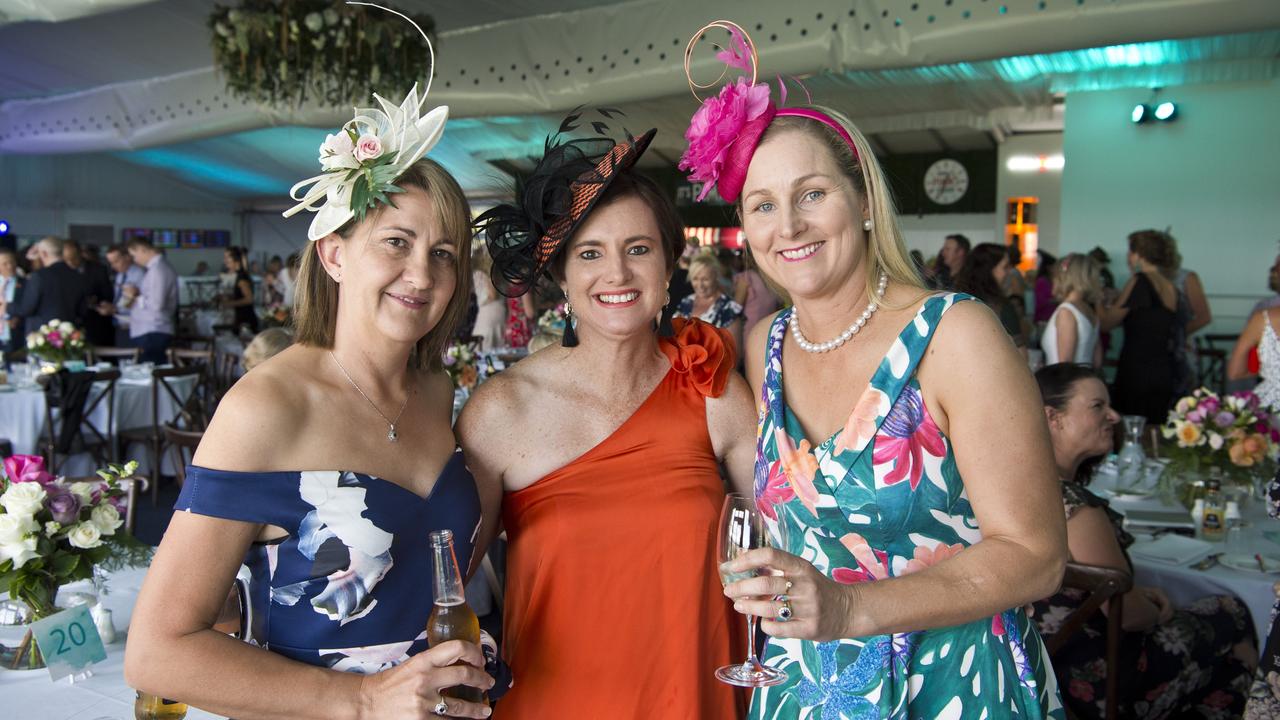 OFF AND RACKING: Grab the girls and make a day of it at Clifford Park’s Ladies Race Day this weekend. At the races (from left) Gemma Johnston, Leonie Ford and Margot Black.