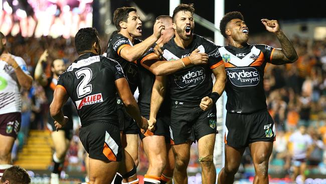 James Tedesco signalled his Origin intentions with a three-try domination of the Sea Eagles at Leichhardt Oval.