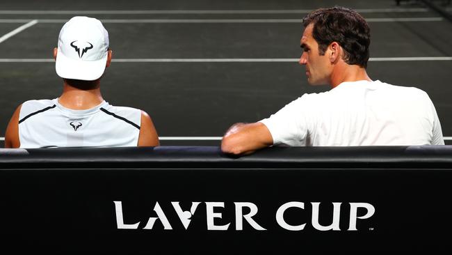 Rafael Nadal (left) and Roger Federer are on the same page when it comes to a potential merger between the ATP and WTA tours. Picture: Getty Images