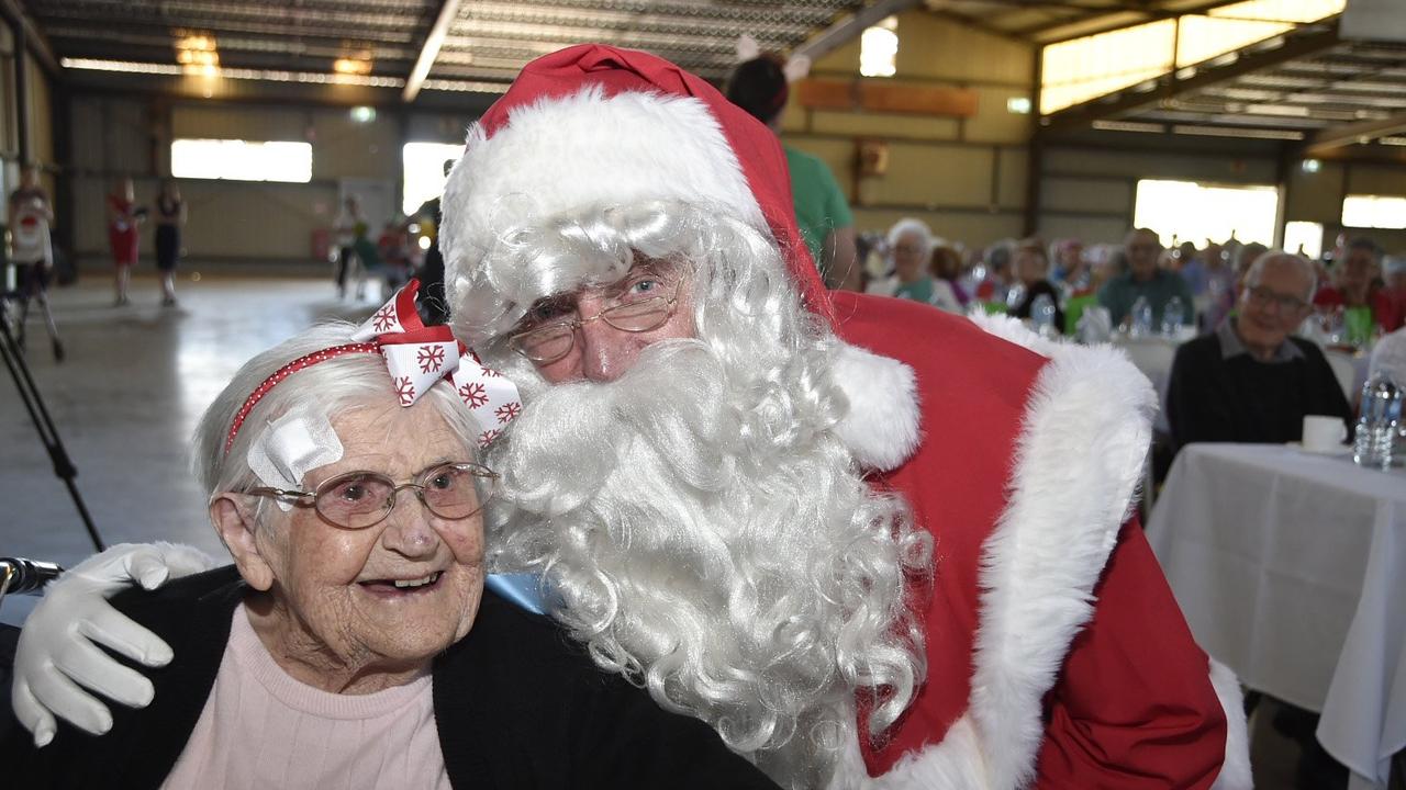 Santa (Town Crier, Kevin Howath) with Pearlie Egart. Mayoral Christmas party for over 80s at the Toowoomba Showgrounds. November 2018