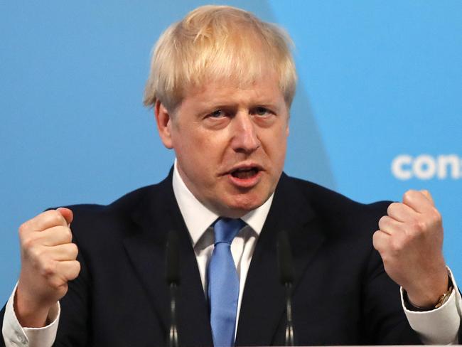 Boris Johnson gestures as he speaks after being announced as the new leader of the Conservative Party in London, Tuesday, July 23, 2019. Brexit champion Boris Johnson won the contest to lead Britain's governing Conservative Party on Tuesday, and will become the country's next prime minister. (AP Photo/Frank Augstein)