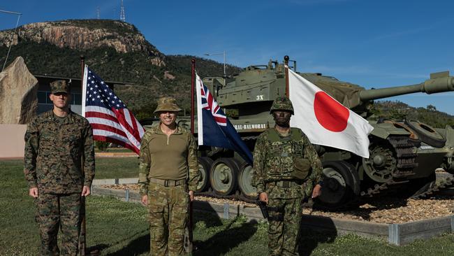 Commander 3rd Brigade Brigadier Ben McLennan CSC, and Bar (centre), United States Marine Corps Task Force Commander, Major Nicholas Foust (left), and Commander 46th Infantry Regiment, Japanese Ground Self Defence Force Colonel Morita Yuya show solidarity in front of 3rd Brigade Headquarters, at Lavarack Barracks, Townsville, on 19 May 2025. PHOTO: CPL Guy Sadler