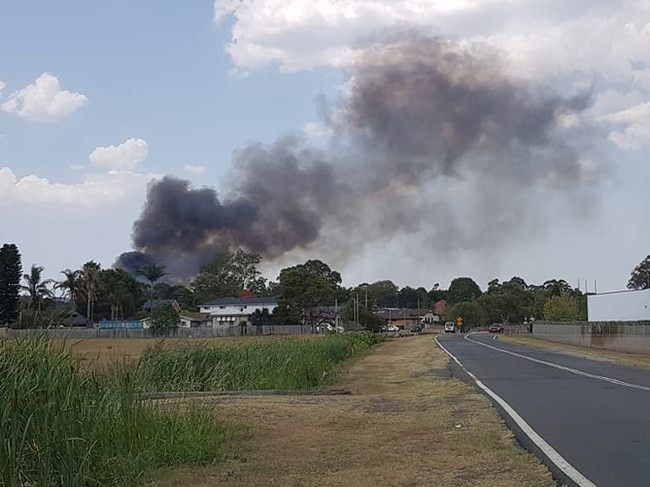 The fire at The Crest reserve, Georges Hall, sparked fears for residents before firefighters put out the blaze. Picture: Sarah Saboune