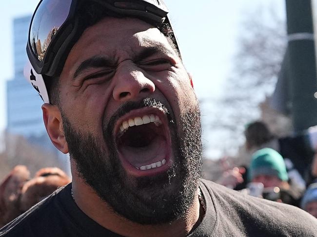 PHILADELPHIA, PENNSYLVANIA - FEBRUARY 14: Jordan Mailata #68 of the Philadelphia Eagles celebrates with fans during the Philadelphia Eagles Super Bowl Championship Parade on February 14, 2025 in Philadelphia, Pennsylvania. (Photo by Mitchell Leff/Getty Images) *** BESTPIX ***