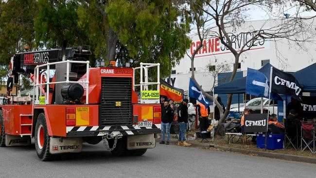 Members of the CFMEU SA are holding a strike out the front of Crane Services in Wingfield over a wage dispute. Picture: Naomi Jellicoe