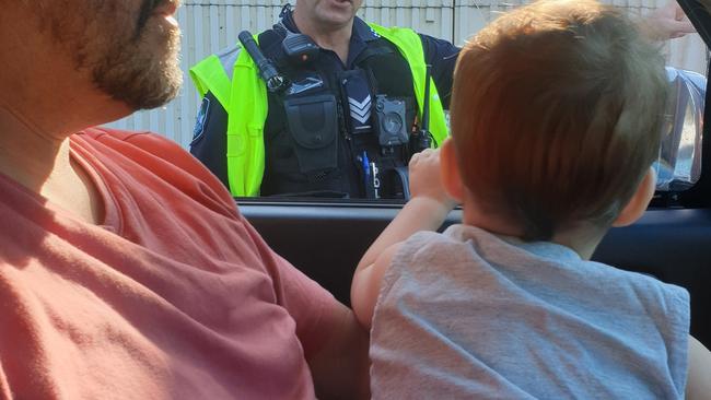 NSW man Darren Budini with his son, as they were turned away the Qld/NSW border on Monday night.