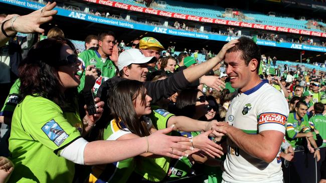 NRL- Rugby League - South Sydney Rabbits vs Canberra Raiders @ ANZ Stadium . Terry Campese celebrates with fans after fulltime . Pic;Gregg Porteous