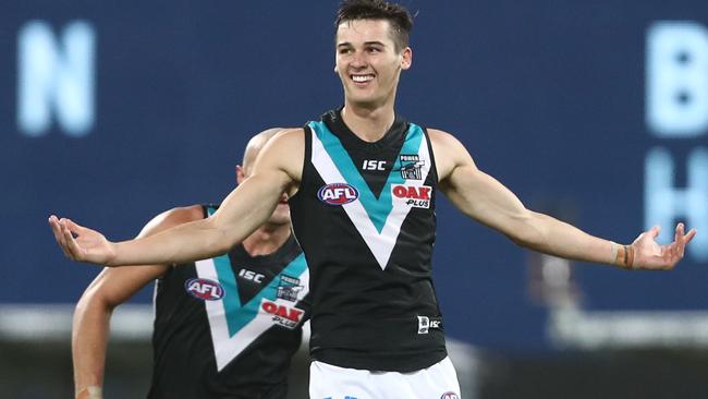 Connor Rozee celebrates one of his five goals against Brisbane at The Gabba. Picture: Chris Hyde/Getty Images