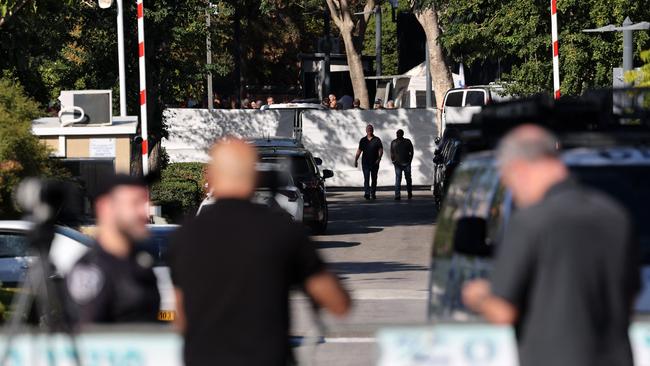 Israeli security forces gather behind a barrier across a street leading to Prime Minister Benjamin Netanyahu's residence in Caesarea on October 19. Picture: AFP