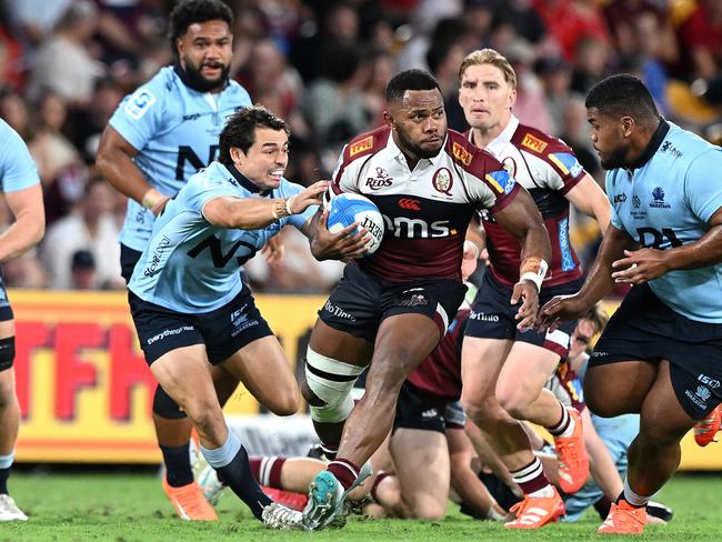 Reds star Filipo Daugunu breaks away from the Waratahs defence. Picture: Getty Images