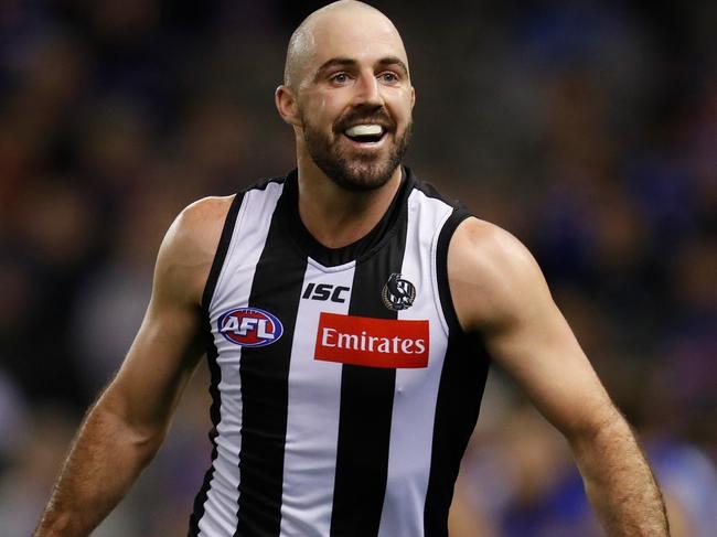 MELBOURNE, AUSTRALIA - JUNE 23: Steele Sidebottom of the Magpies celebrates a goal during the 2019 AFL round 14 match between the Western Bulldogs and the Collingwood Magpies at Marvel Stadium on June 23, 2019 in Melbourne, Australia. (Photo by Michael Willson/AFL Photos via Getty Images)