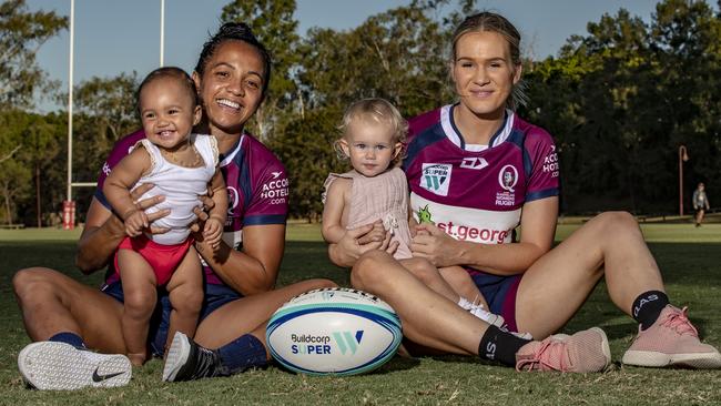 Amy Turner with daughter Kovah and Charlotte Kennington with her daughter Luna. Pic: Brendan Hertel/QRU