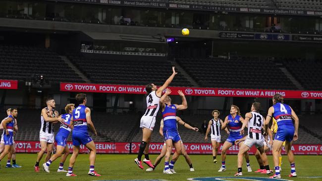 Collingwood and the Western Bulldogs play in front of an empty stadium during Round 1. Picture: AAP