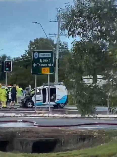 A van burst into flames producing plumes of smoke after a crash on a Logan Motorway on-ramp at Drews Road in Loganholme on Tuesday, April 4, 2023. Still from a video by Karlina Gil