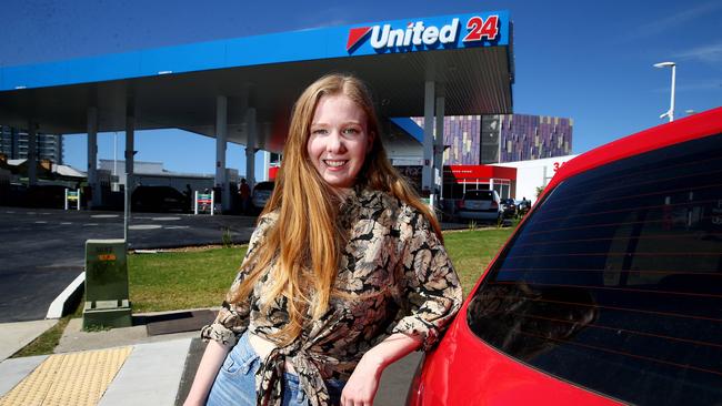 Caitlin Smollett at United Woolloongabba. They have the cheapest petrol in Brisbane metro today at 84.9cpl. Pics Adam Head