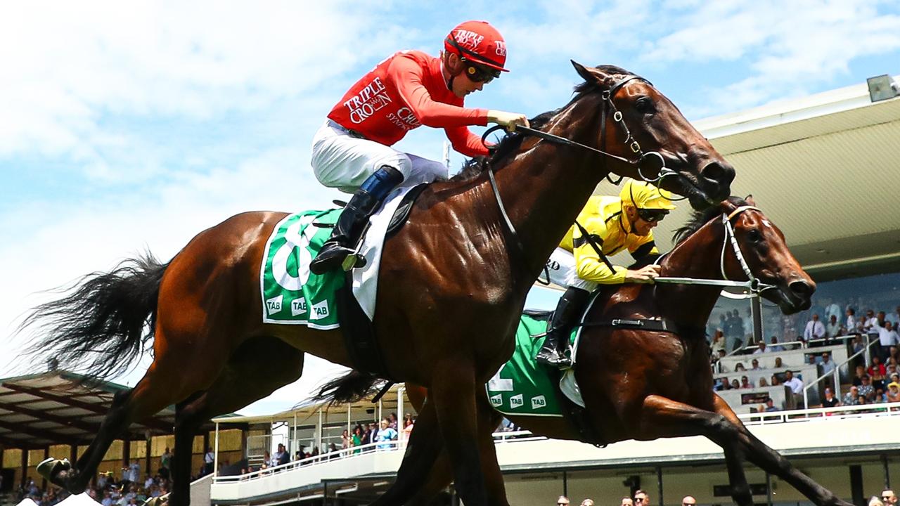 Harry Davies gets his first Australian win on Kujenga (red) at Wyong on Saturday. Picture: Getty Images