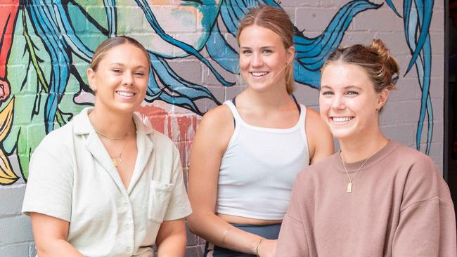 Sophie Walters, 19, Jessica Saunders, 19, and Piper Harrison, 20, in Manly. Picture: Ryan Osland