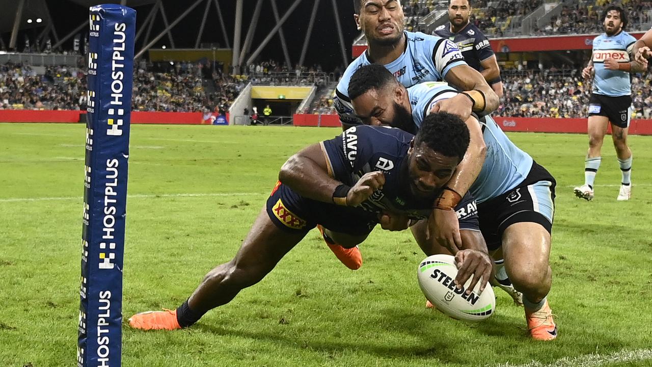 Semi Valemei scores a try against the Sharks. (Photo by Ian Hitchcock/Getty Images)