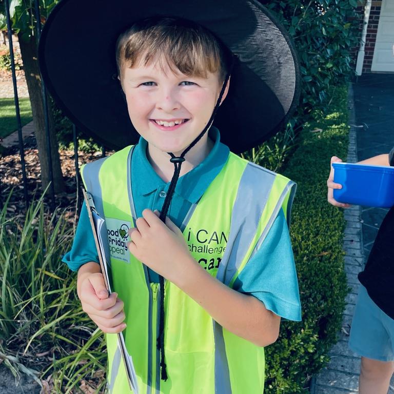 Oscar Taylor, 10, raised more than $2600 by door knocking in his community before the walk.