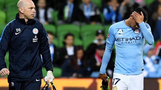 Tim Cahill of Melbourne City walks off after injuring his ankle during the round 2 Melbourne City FC and Sydney FC match at AAMI Park in Melbourne, Friday, November 3, 2017. (AAP Image/Tracey Nearmy) NO ARCHIVING, EDITORIAL USE ONLY