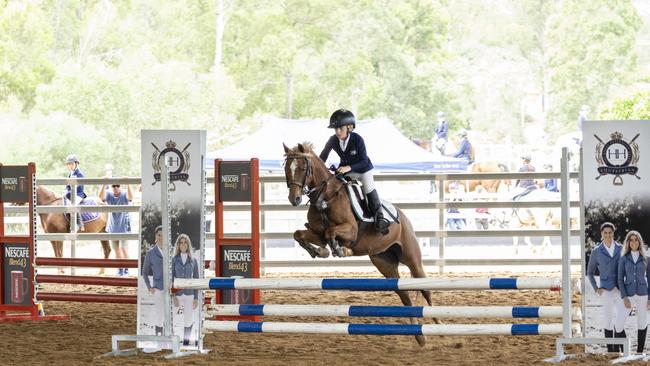 Jameson Bazzan competes at the Victory College Interschool Show Jumping Competition at the weekend.