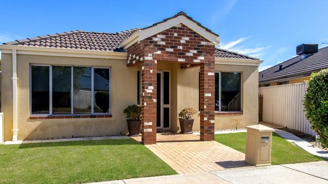 This three-bedroom house at 22 Amity Circuit, Shoalwater, is on the market for $549,000.