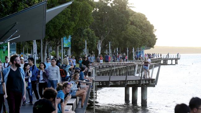 Tourists and locals pour onto the Cairns Esplanade taking in the beautiful Cairns winter weather. The Esplanade board walk. PICTURE: STEWART MCLEAN