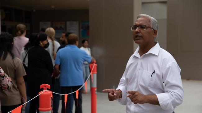 Riverstone candidate Mohit Kumar give his final pitch to voters outside Blacktown Leisure Centre in Stanhope Gardens. Picture: Nathan Schmidt