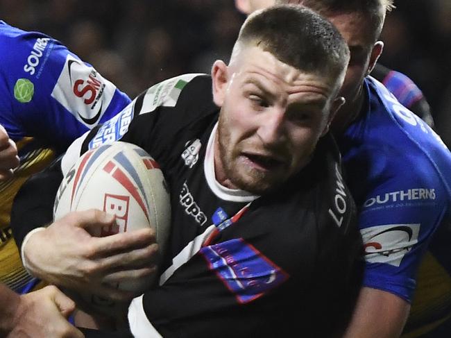 LEEDS, ENGLAND - SEPTEMBER 06: Jackson Hastings of Salford Red Devils is tackled during the Betfred Super League match between Leeds Rhinos and Salford Red Devils at Emerald Headingley Stadium on September 06, 2019 in Leeds, England. (Photo by George Wood/Getty Images)