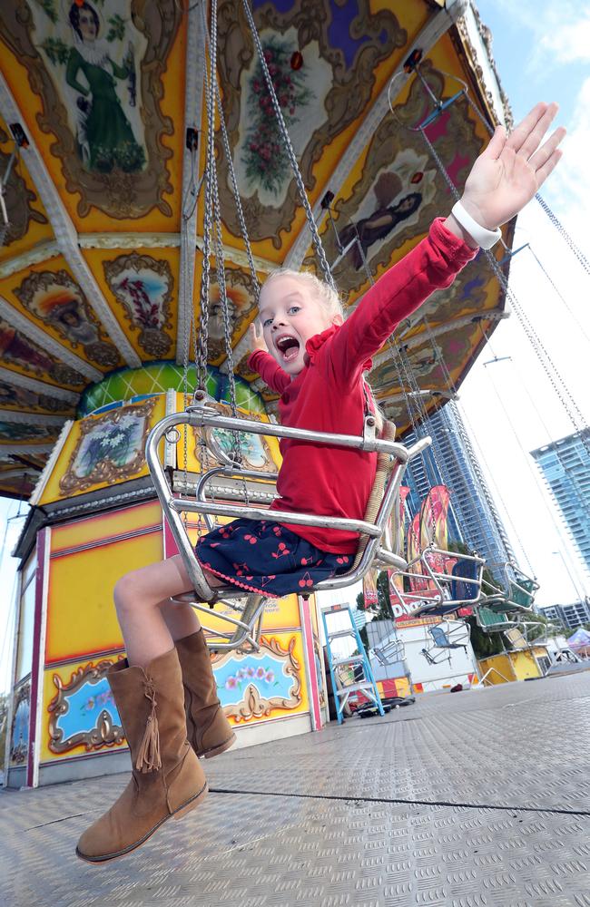 Gold Coast Show is on from tomorrow. Photo of Paige Fisher (6) on the swings. Photo by Richard Gosling