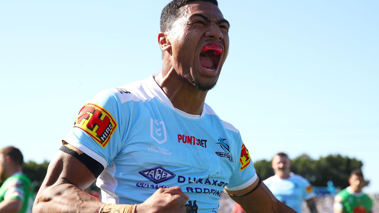 Ronaldo Mulitalo celebrates scoring a try against Canberra in Round 24