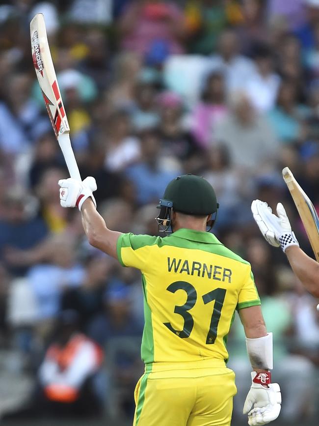 David Warner celebrates his half century. Picture: AP