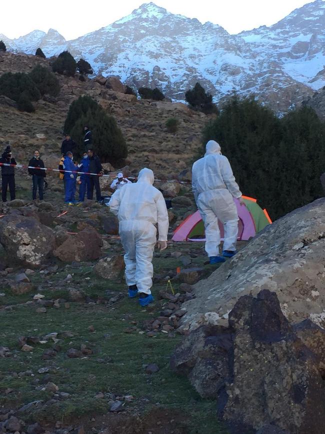 A forensic team at the area where the bodies of the two Scandinavian women were found dead in the High Atlas Mountain. Picture: 2M via AP