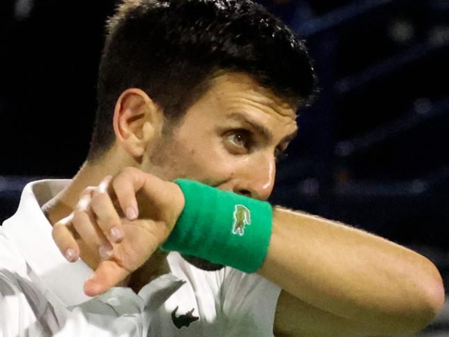 Serbia's Novak Djokovic reacts during his quarter-final match with Czech Republic's Jiri Vesely at the ATP Dubai Duty Free Tennis Championship, in the Gulf emirate on February 24, 2022. (Photo by Karim SAHIB / AFP)