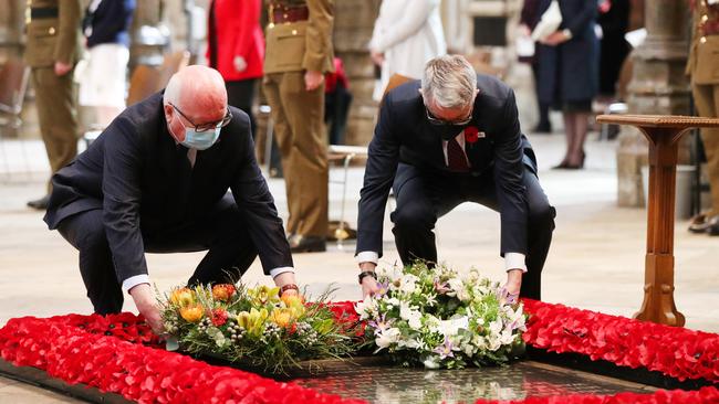 Australian High Commissioner George Brandis and New Zealand High Commissioner Bede Corry place wreaths by the British grave of the Unknown Warrior during the annual Service of Commemoration and Thanksgiving at Westminster Abbey.