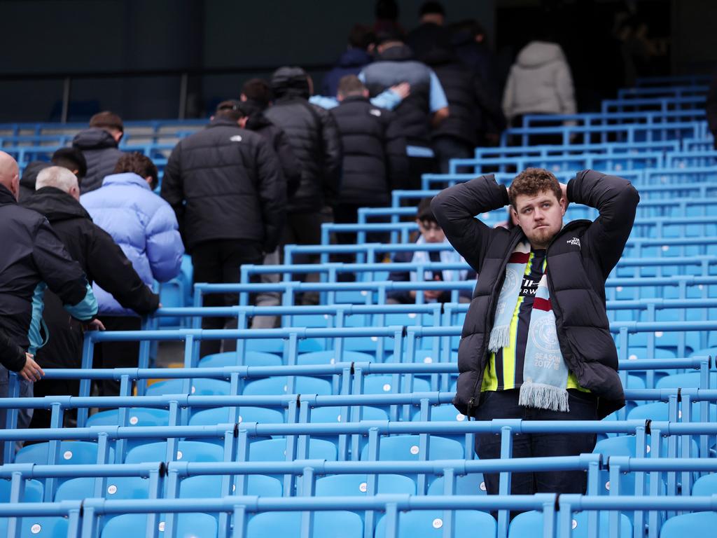 A Manchester City fan looks dejected after their draw. Picture: Getty