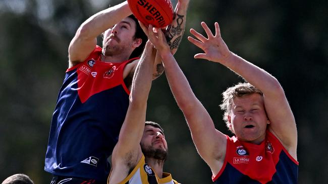 Diamond CreekÃs Robby Noble and ThomastownÃs Daniel Caruso during the  NFL football match between Diamond Creek and Thomastown in Epping, Sunday, Aug. 21, 2022. Picture: Andy Brownbill