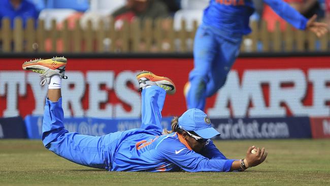 India's Veda Krishnamurthy takes a catch on the boundary of England's Anya Shrubsole.