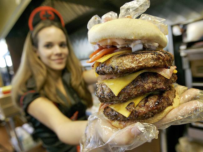 Cop a whack if you don’t eat this at the Heart Attack Grill. (AP Photo/Matt York)