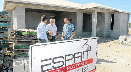 Housing Industry Association area manager Russell Parnicott (left) Esprit Constructions owner Peter McGrath and Travis Norton check progress at a Kerrisdale Estate building site at the weekend. Picture: Peter Holt