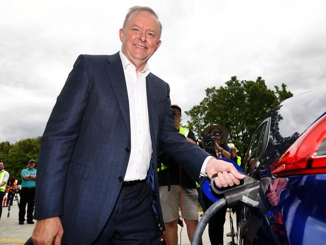 BRISBANE, AUSTRALIA - NewsWire Photos - FEBRUARY 10, 2021.Federal Opposition Leader Anthony Albanese charges an electric car as he visits electric vehicle chargers manufacturer Tritium in Brisbane. Mr Albanese is expected o make an announcement regarding industrial relations tonight. Picture: NCA NewsWire / Dan Peled