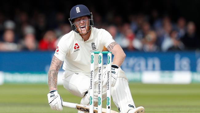 England's Ben Stokes reacts as he gets hit by the ball during play on day five. Picture: AFP