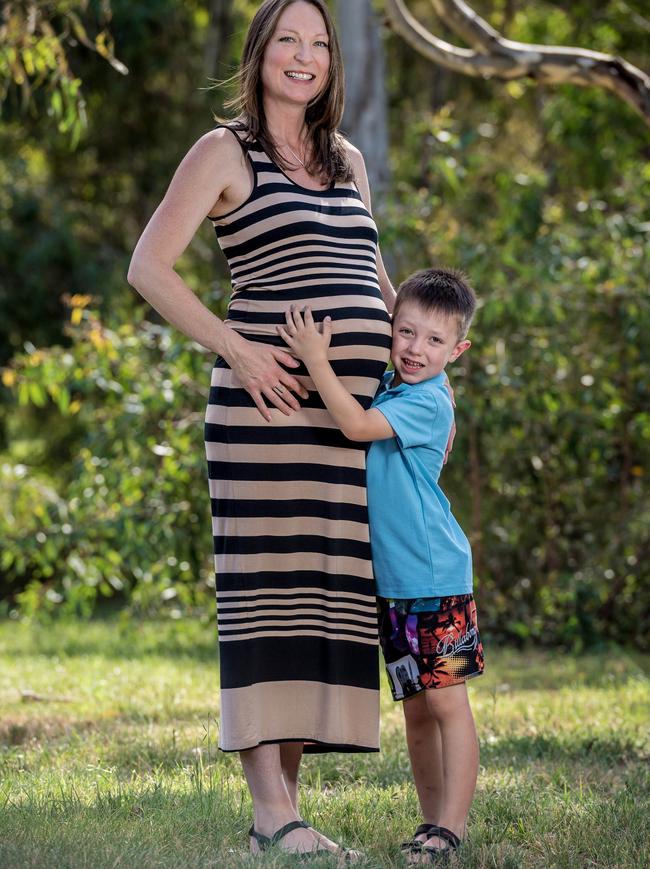 Briony Swart, who is 36 weeks pregnant, with her six-year-old son Oscar, has had two early miscarriages and lost two babies at 21 weeks. Picture: Jake Nowakowski