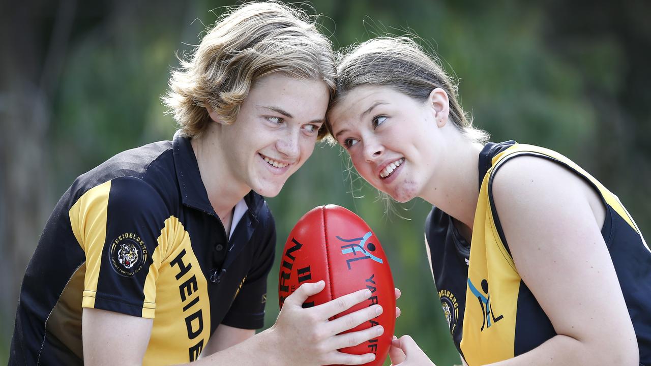 Yarra Junior Football League players Jordan and Mackinlie, both 15, of the Heidelberg Tigers, will have concussion tests after on-field incidents. Picture: David Caird