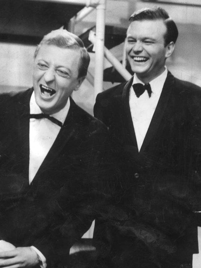 Graham Kennedy, left, laughing with Bert Newton during TV program IMT (In Melbourne Tonight).